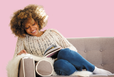 Lady reading on the sofa